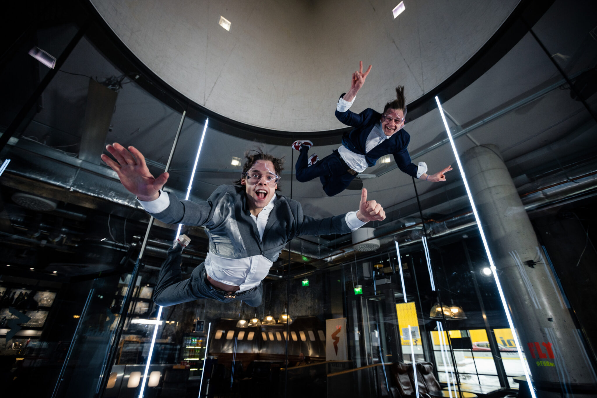 Two men flying in suit